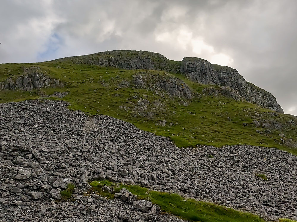 Looking up at Attermire Scar from the gate