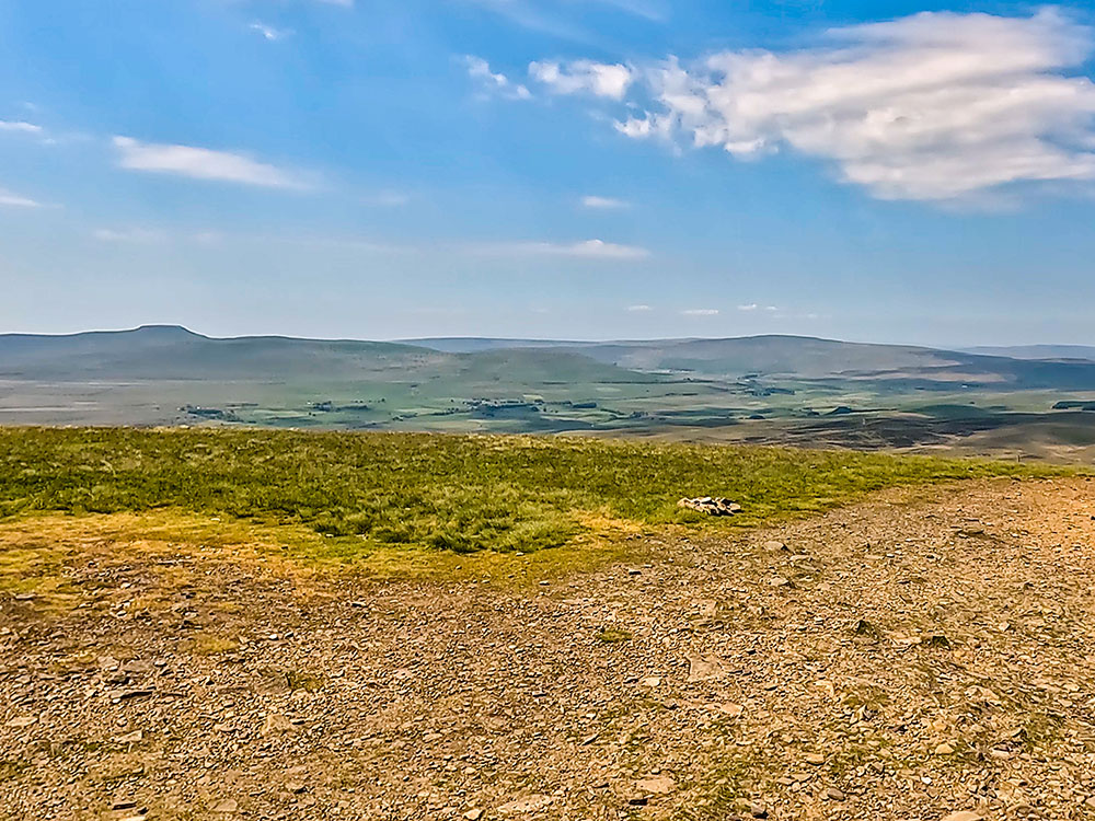 View towards Ingleborough, Whernside and the Ribblehead viaduct from Pen-y-ghent summit
