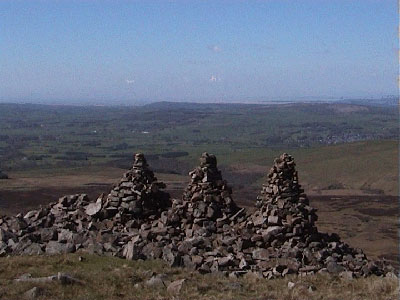 The Three Men looking out towards the sea