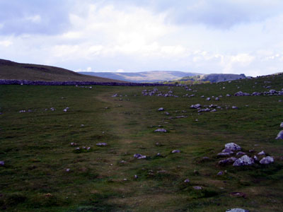 Passing through sites of old settlements, Fountain Fell ahead