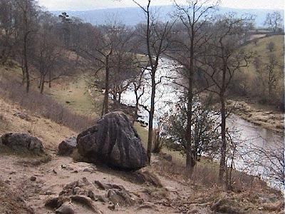 Boulder marking the return down to the riverside