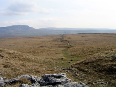 Looking back at the path leading to the second signpost